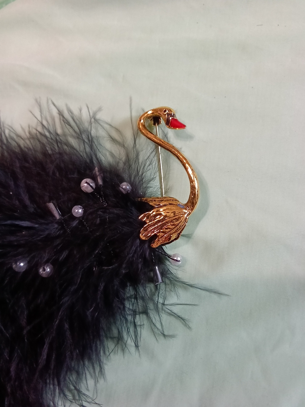 Gold Swan Brooch with Black Feather Accents